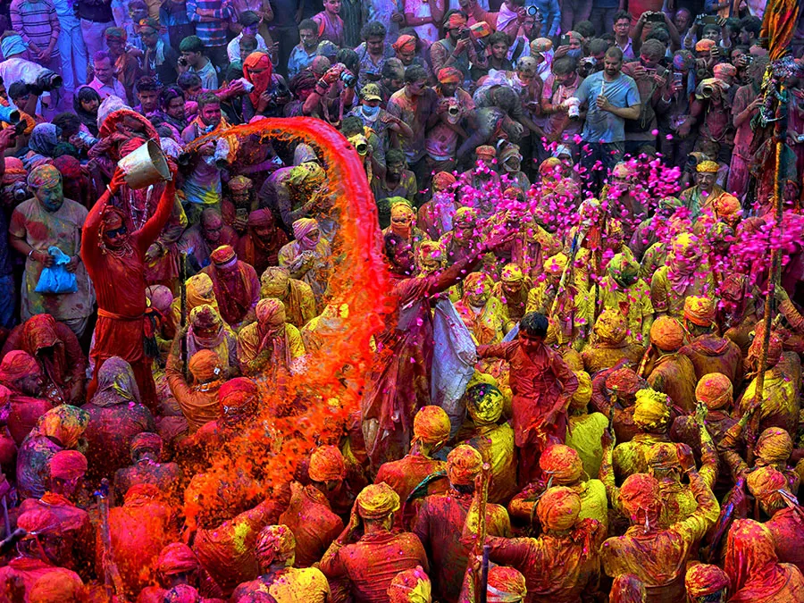 Traditional Holi sweets like gujiya and malpua, highlighting the festival's culinary delights
